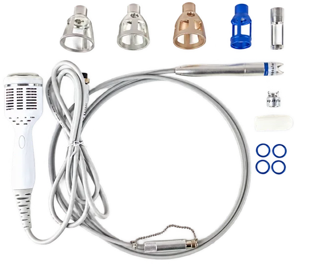 Handpiece with five interchangeable tips, focusing rings and delivery fiber